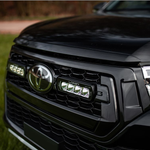 Load image into Gallery viewer, Toyota Hilux Rogue (2018+) Grille Mount Kit - Lazerlamps ST4 Evolution
